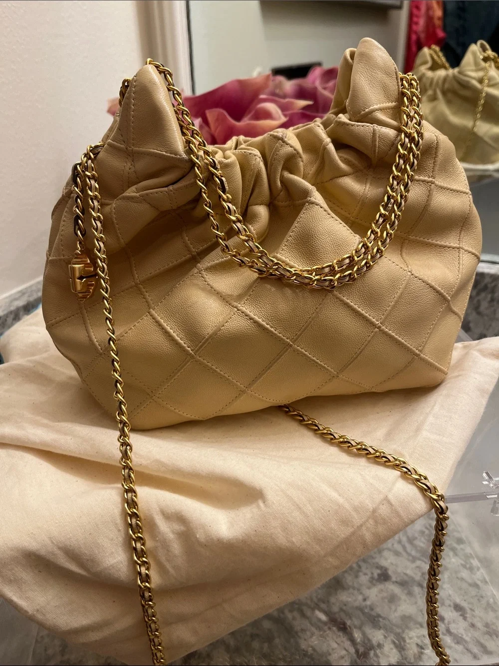 Tory Burch Quilted Drawstring Shoulder Bag in Beige with Gold Chain
